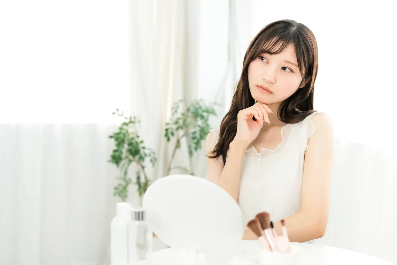 Woman considering plastic surgery